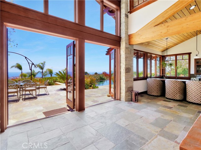 Double French Doors welcome you outside to the private Terrace with expansive views.