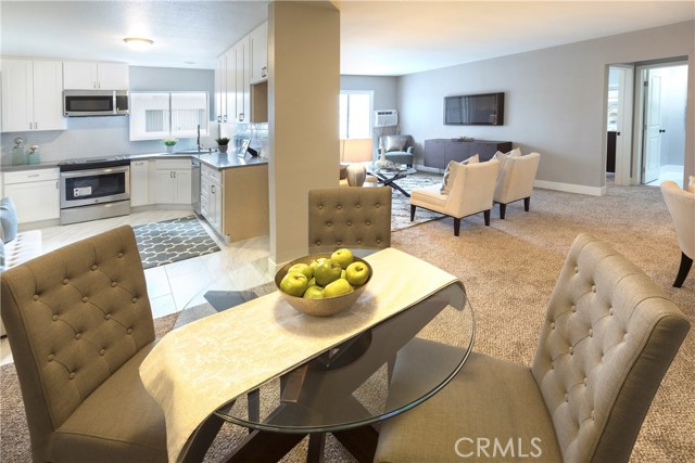 Dining Area looking into Kitchen and Living Room