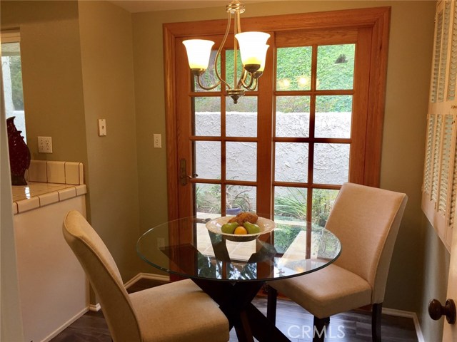 Breakfast area overlooking the private patio. Breakfast area overlooking the private patio.