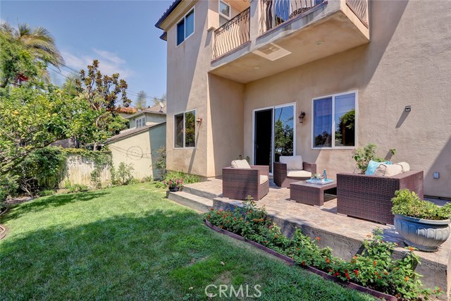 Your own Lemon Tree and entertaining patio just off the family room.