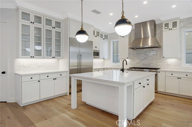Great kitchen for cooks with walk-in pantry, two sinks, beverage center, thoughtful cabinets and Thermador appliances.