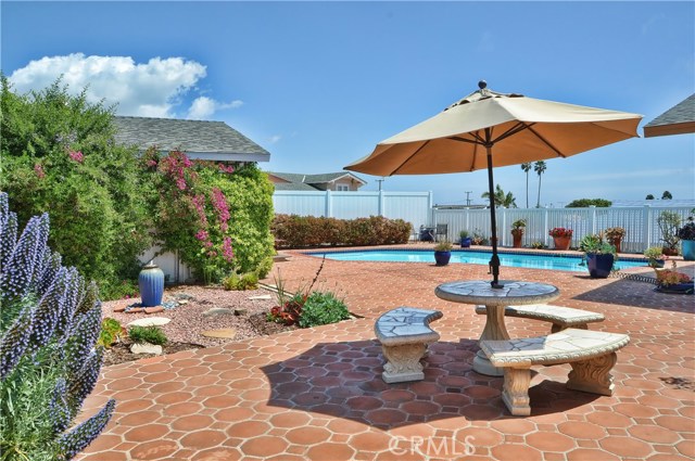 Serene Patio with beautiful flowers throughout