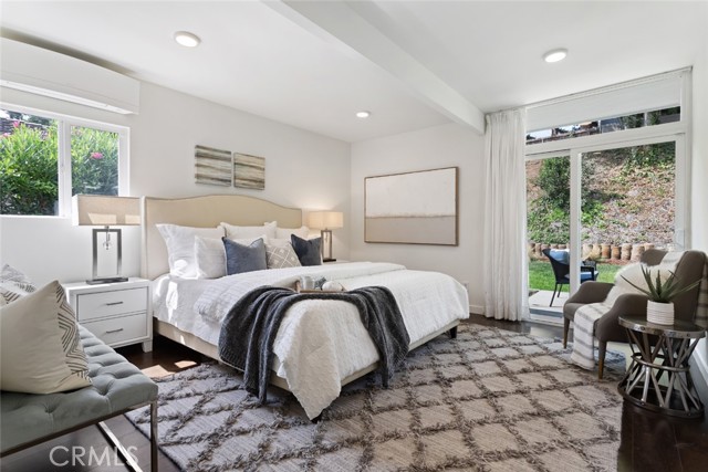 Master bedroom with direct access to large rear yard