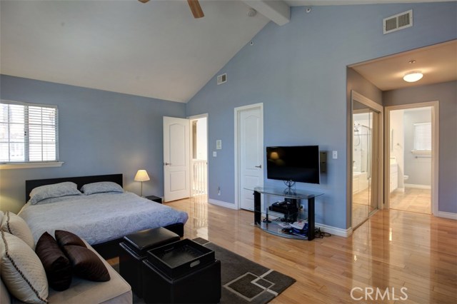 Master bedroom suite with view toward master bath and additional closets