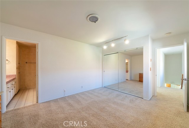 Spacious guest bedroom with attached full bath