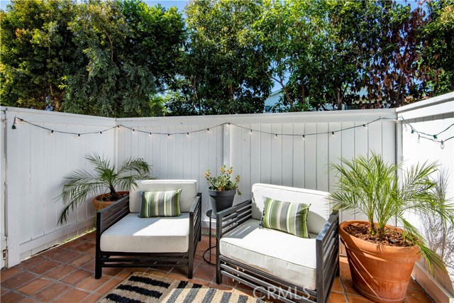 Only the end units have this charming, private saltillo tiled patio off of the main bedroom.