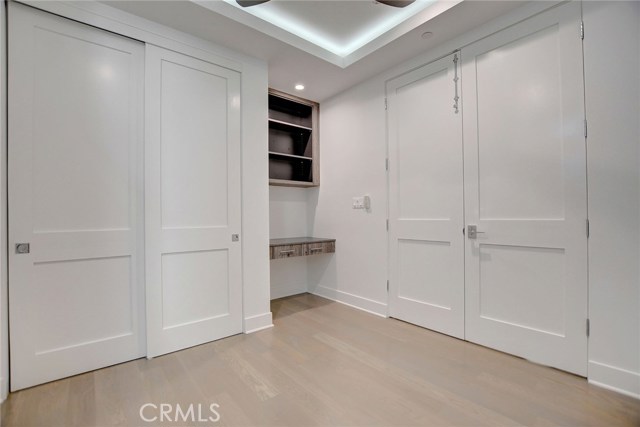 1st Level . . . Bedroom/Offie with built in desk and closet