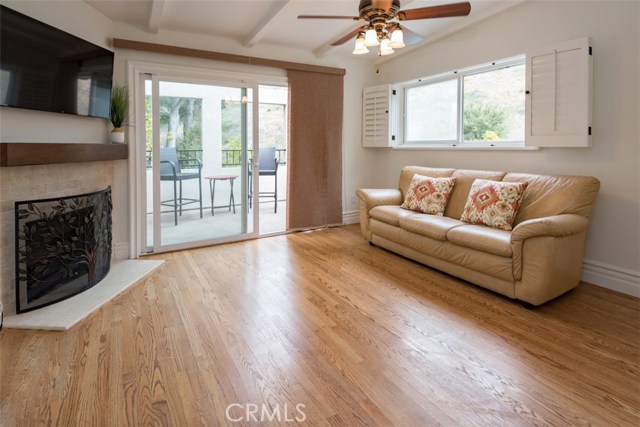 4th bedroom up spiral staircase on separate side of house. Perfect for in-laws or maid. Balcony overlooks woods, hillside and pool. Gas fireplace, plantation shutters and ceiling fan.