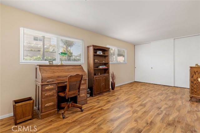 This is a 23' long room and was originally a 5 bedroom floorplan.  A previous owner must have removed the wall separating the two rooms as both closets are still in place. Could be re-configured to a 5 bedroom if so desired...
