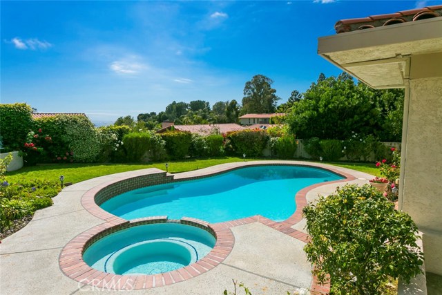 Grassy yard plus rose garden