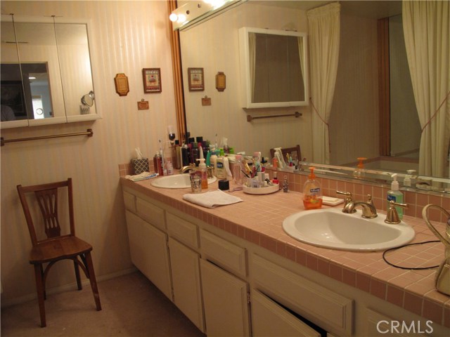 Master bath with long and deep vanity cabinet