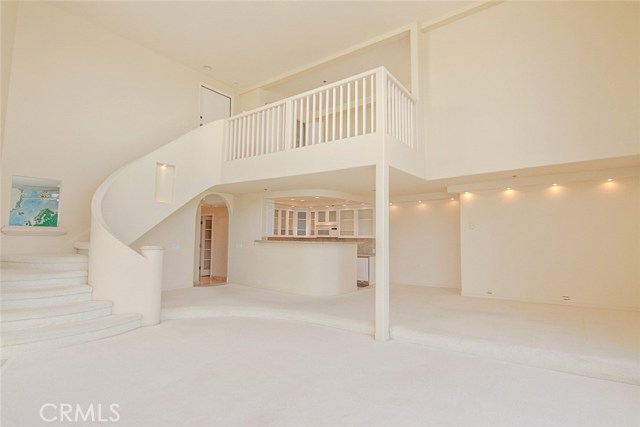 Sweeping Staircase leading to Loft Bedroom and Roof Top Decks
