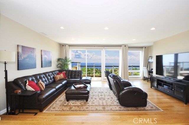 Warm and inviting family room also enjoys the magnificent view.