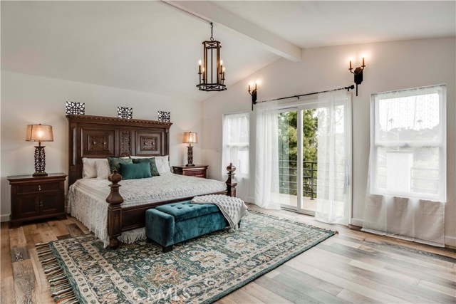 The master bedroom is a dream with private balcony and spa-like master bath