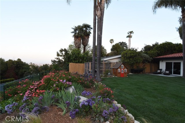 Pretty landscaping past the grassy area...