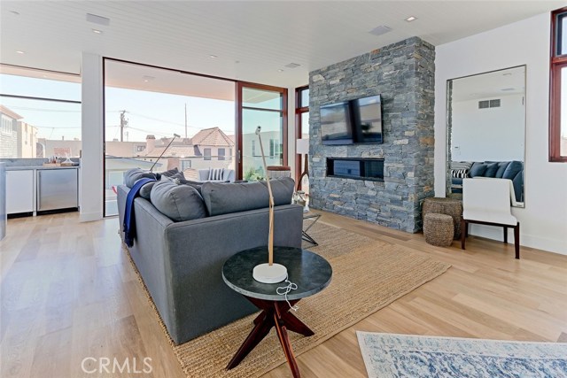 Note the wide-plank European white oak floors throughout