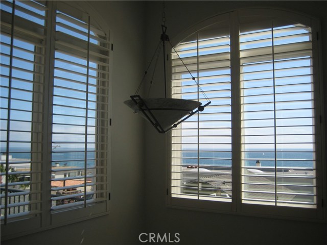 Panoramic views through the custom wood blinds...