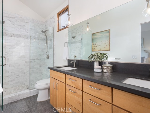 Master bathroom walk-in shower and dual vanity