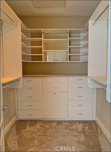 The custom master bedroom closet provide efficiency and organization - this is a definite must-have for your wardrobe.