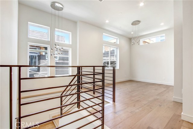 View of the versatile bonus room that can be used as an office, family room, den or play area
