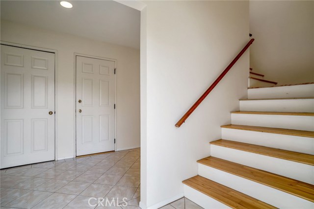 BACK HOUSE: ENTRANCE WITH LAUNDRY AT THE LEFT DOOR AND DIRECT GARAGE ACCESS TO THE DOOR ON THE RIGHT. MASTER BEDROOM DOWN THE HALL WITH 3/4 BATHROOM.