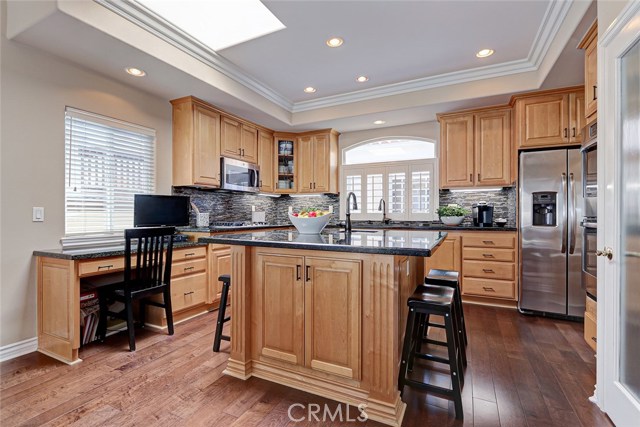 Extensive counter space and workstation in kitchen