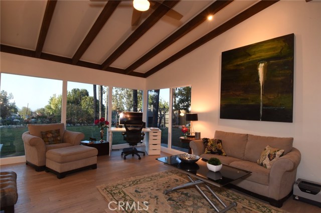 Beautiful family room beyond the living room...also with views of the yard and city lights!