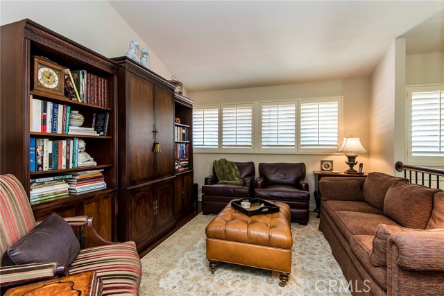 Currently being used a media room, the dedicated office, loft space on the entry level adds flexibility to the floor plan.