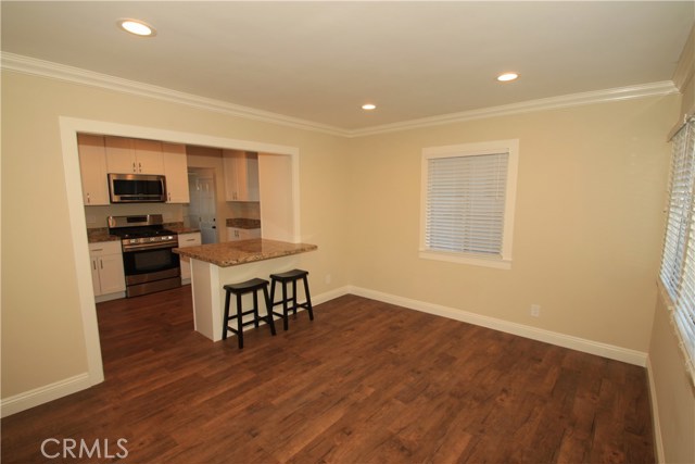 Another view of front house living room.  Kitchen beyond is adorable, too!  Tenant in this unit is wonderful, and would love to stay until at least 2025! :)