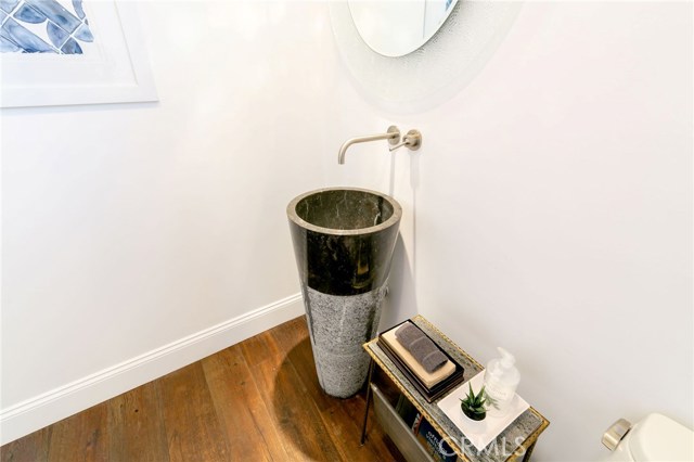 1/2 bathroom upstairs with pedestal sink