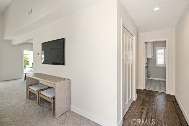 Entry/foyer leading into the laundry room.