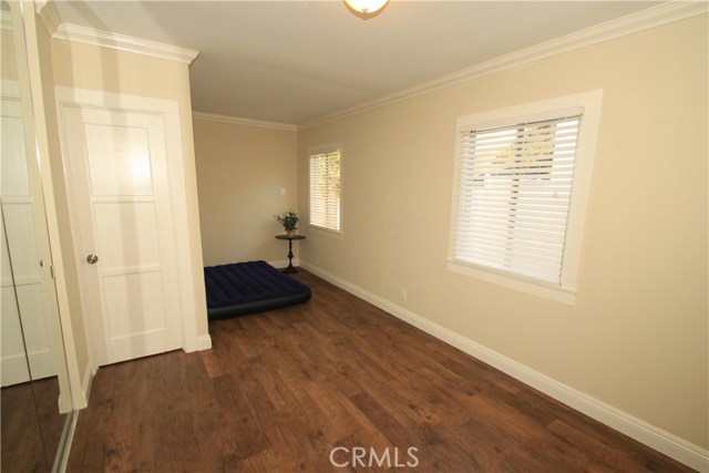 Bedroom #2 is large, and looks out onto the rear yard.  Door leads to the bathroom!