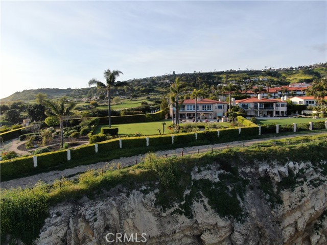 Oceanside walking trail bordering the property's edge