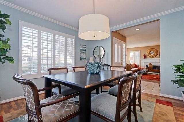 Formal Dining Room Area Adjacent to Formal Living Room Area