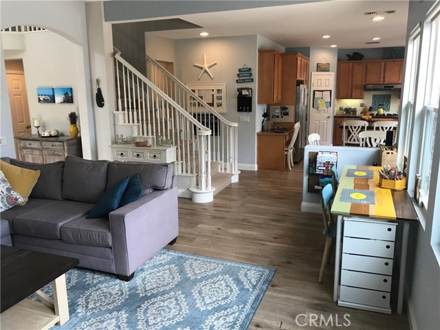 Living room is open to the kitchen and easy access to 2nd floor