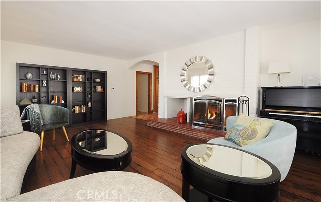 Spacious living room with fireplace.