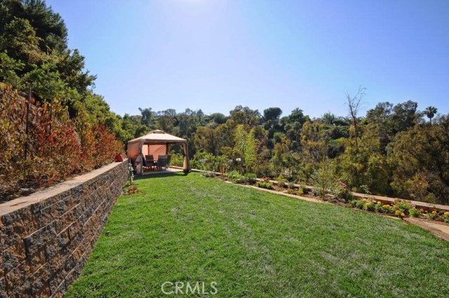 Grassy Backyard with Gazebo