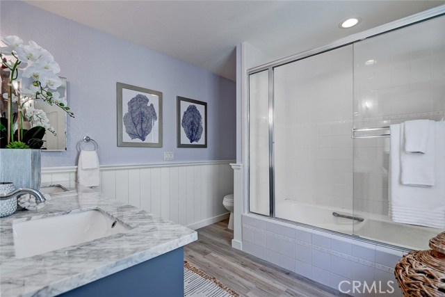Extra spacious shower/tub combo is perfect for spa-like relaxation.