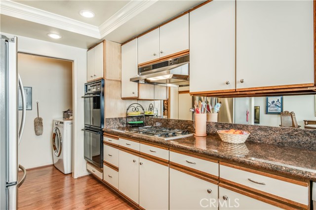 Pocket door opens to laundry room/walk-in pantry.