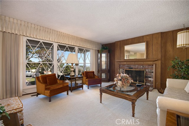 Living Room open to front porch with city, harbor view