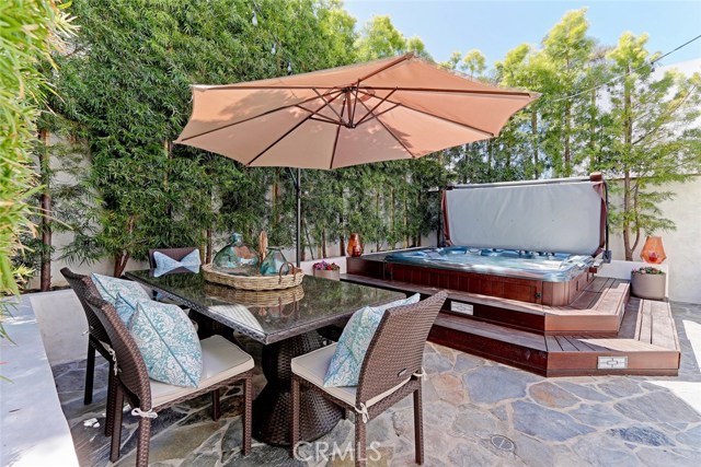 Private backyard oasis with new Sundance top of the line spa.