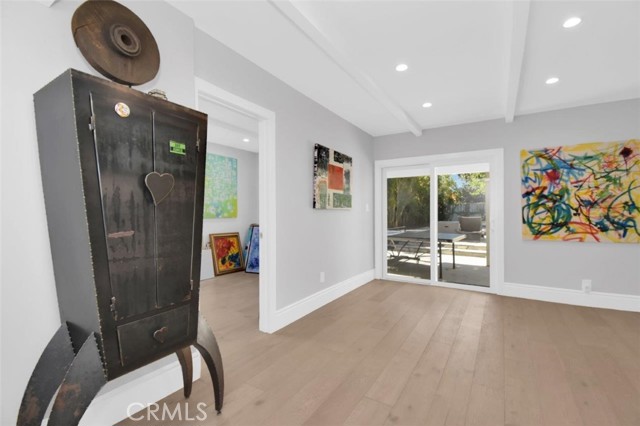Enter the lower level family room; you can peak at the 4th bedroom as well!