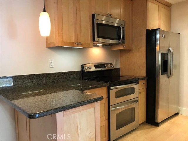 Kitchen with Stainless Steel Appliances.