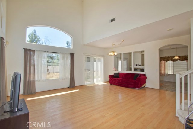 Immediately as you enter the home, you have a spacious living/family room