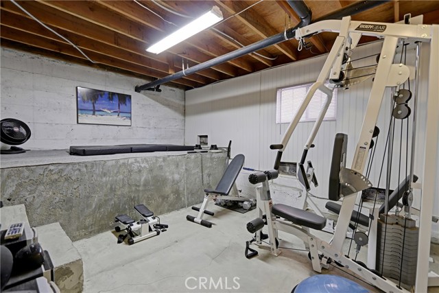 Awesome, storage/workout room downstairs. This would make a great wine cellar, more storage or keep as a gym or office.