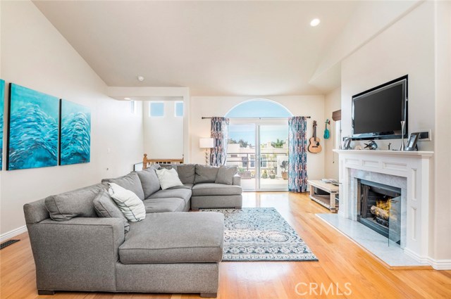 One of two living room balconies in view in this photo.  Built in TV and speakers are included with the sale.