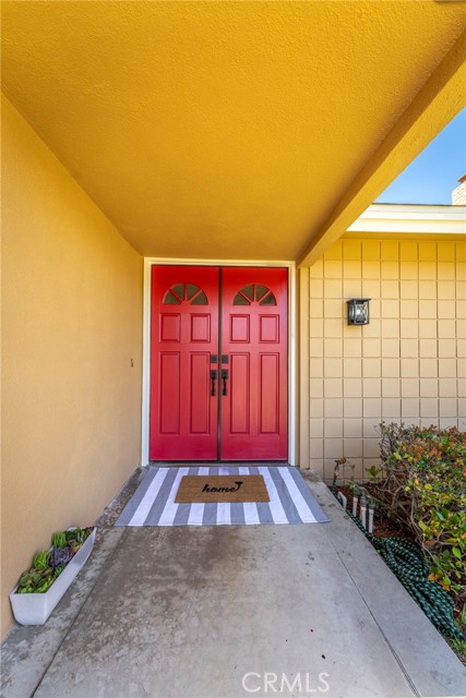 WELCOME !!   Inviting covered front door entry.