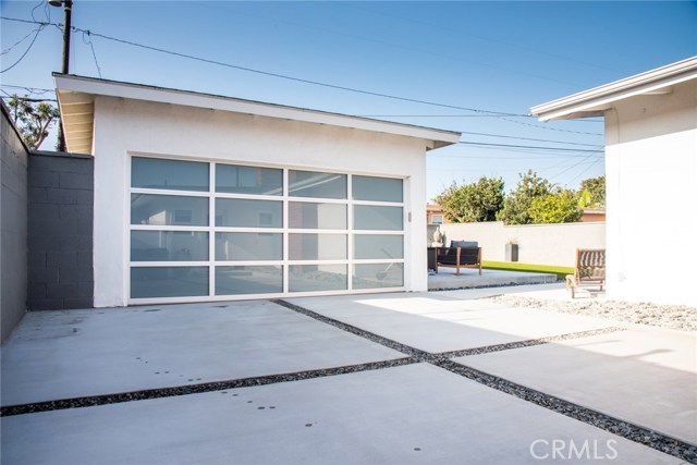 Private 2 car detached garage with new garage door