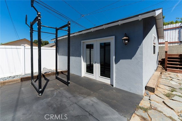 Lower outdoor space. Perfect for outdoor gym or hot tub or extra play space.