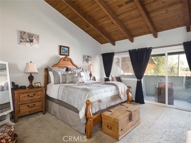 Master Suite with cathedral ceiling and balcony